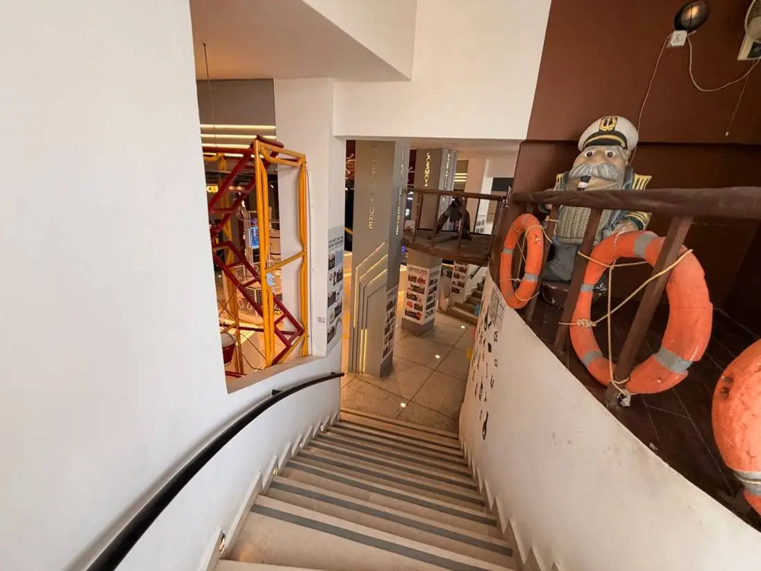The foot of the staircase at Joy of Science Lahore, looking into the Central Foyer