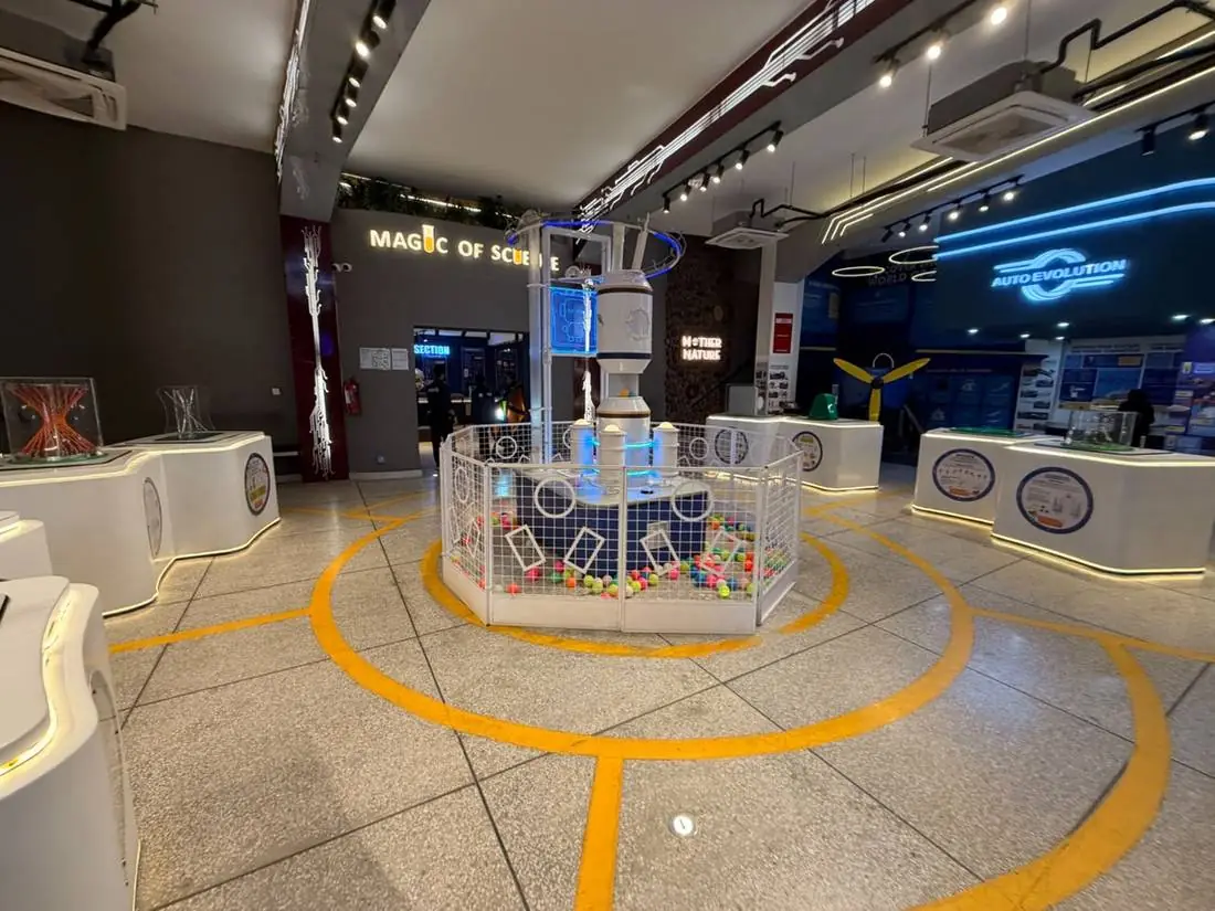 The full Central Foyer at Joy of Science Lahore seen from the exhibit floor